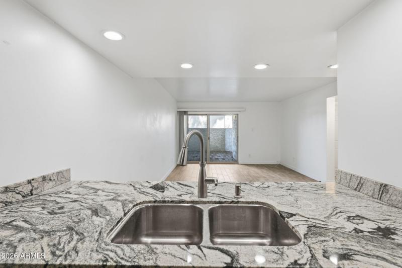 KITCHEN OPENS TO GREATROOM