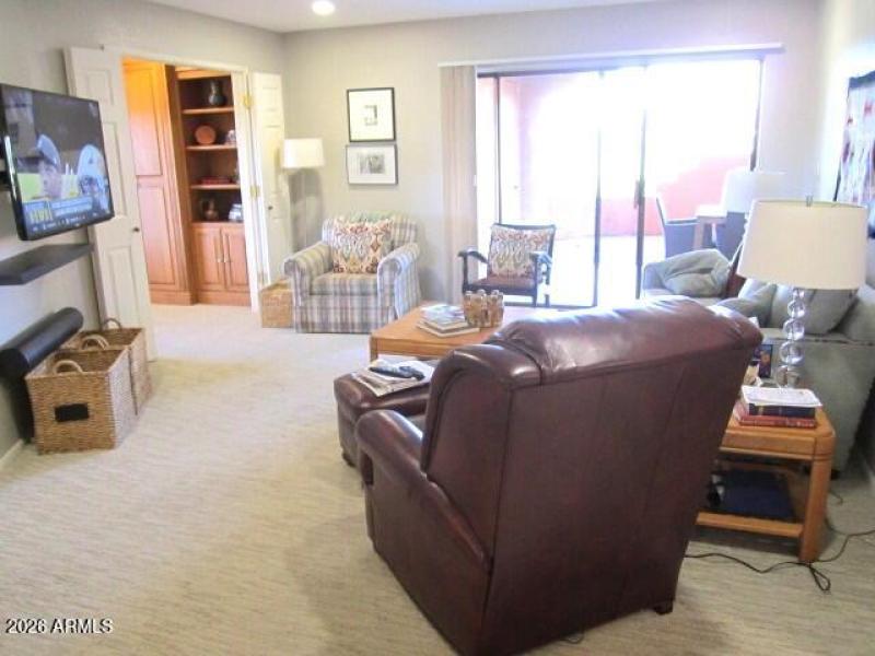 10 130 LIVING ROOM OPENS TO PATIO AND BE