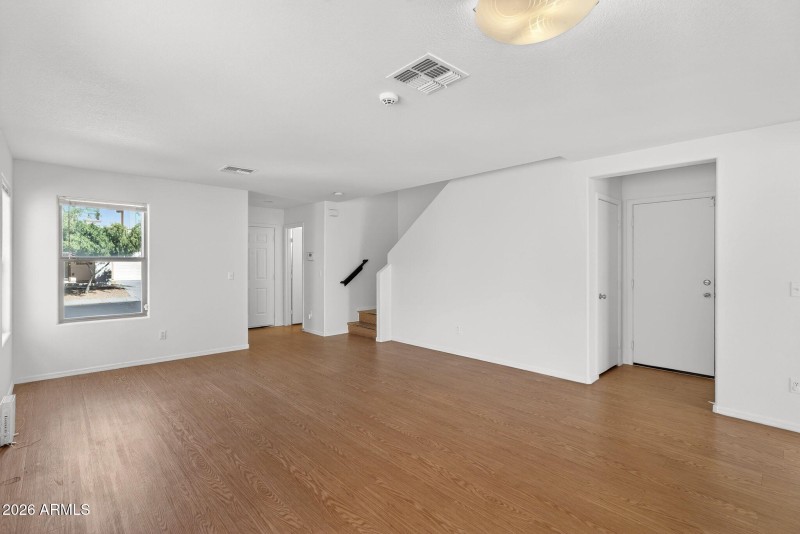 Bright Living Area with Staircase