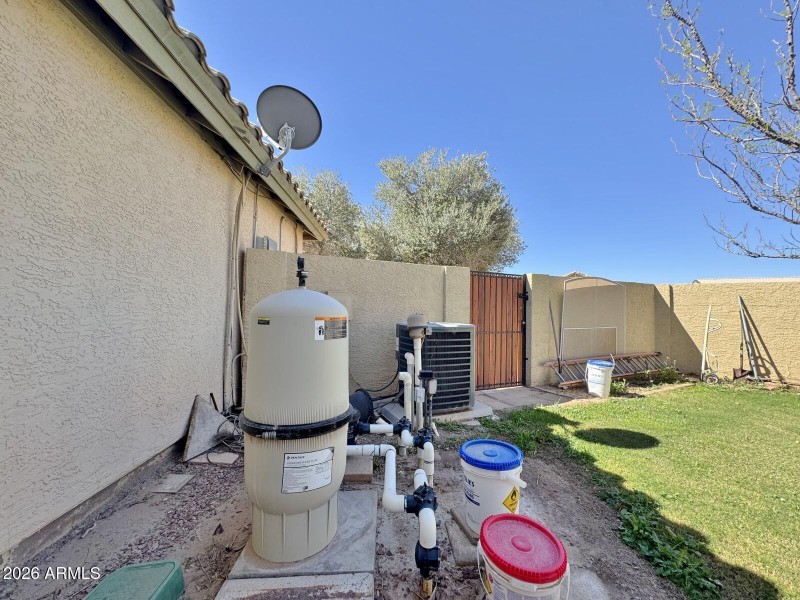 Pool equipment in side yard