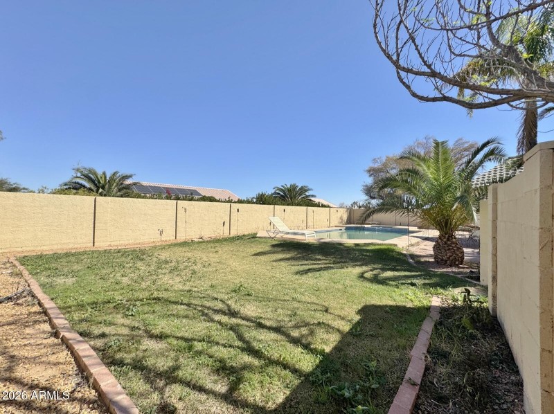 Large separate fenced yard for pool