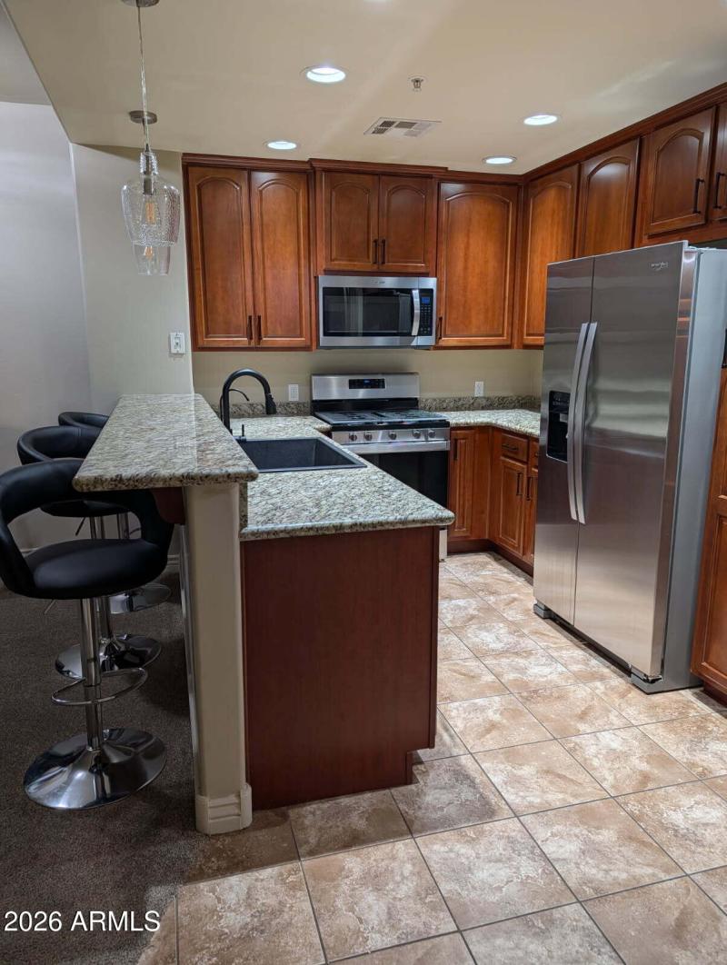 Gas Cooktop and Farmhouse Sink