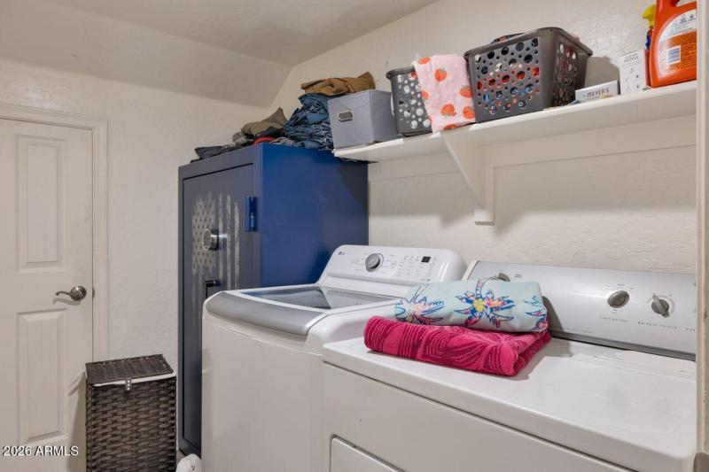 Laundry with understair storage
