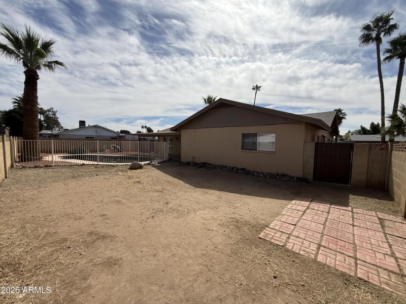 Backyard With Pool And Patio