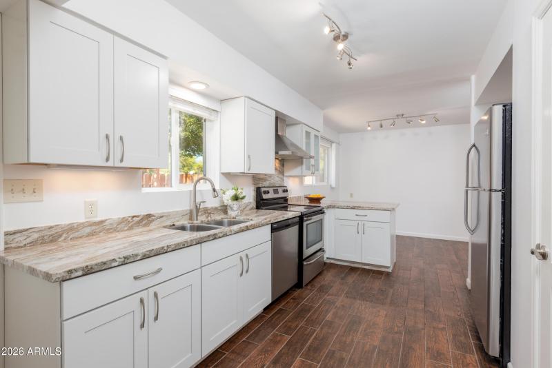 Updated kitchen w/ granite counters