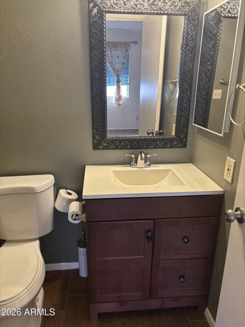 Mirror accents the vanity perfectly