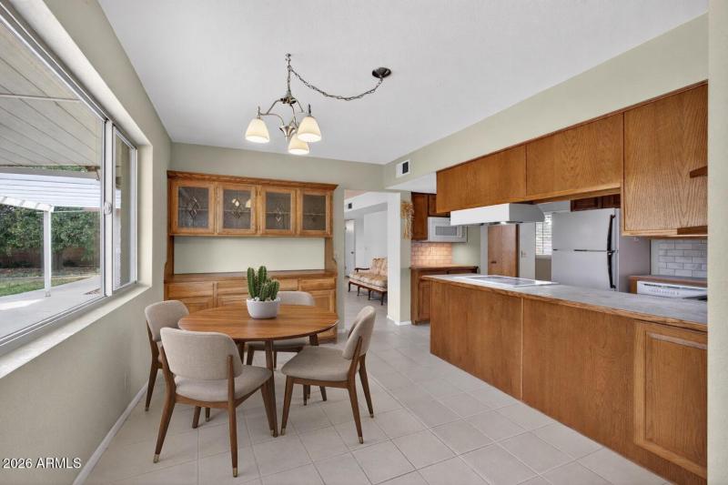 Eat in nook with custom cabinetry staged