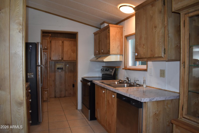 Kitchen looking from dining area