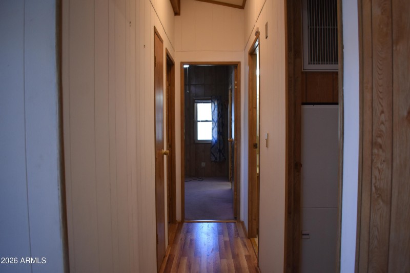 Hallway going to beds and baths