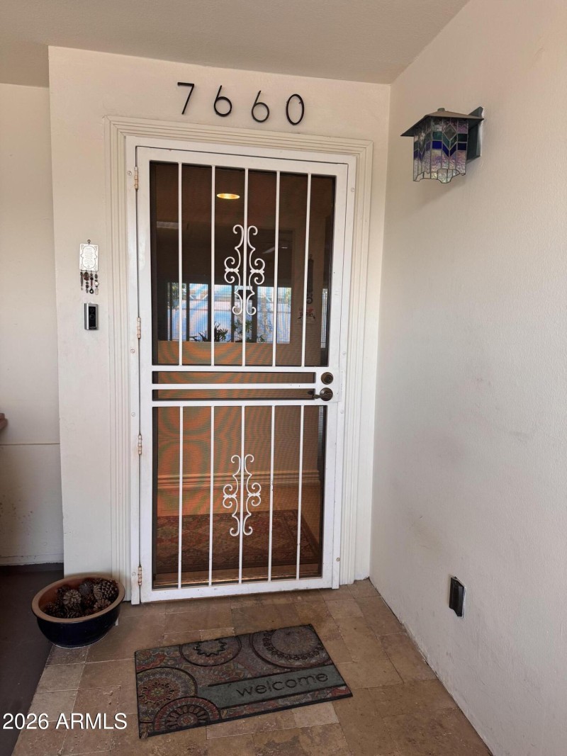 Security screening doors for breezes