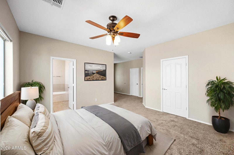 Primary suite digitally staged