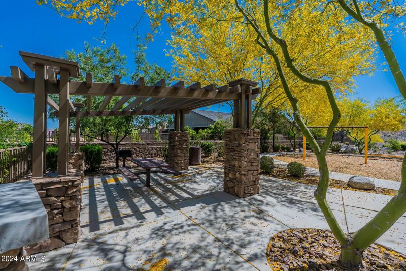 Shaded seating areas by park.