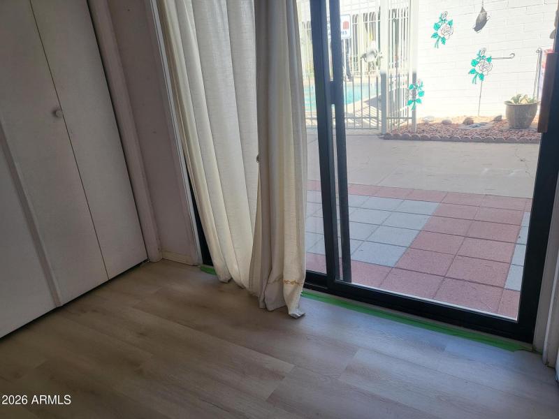 ENCLOSED PATIO & ADDED STORAGE