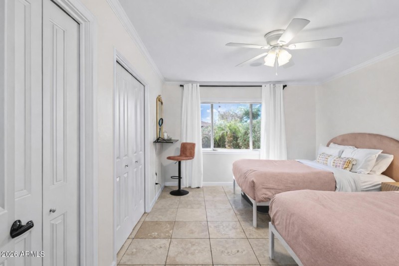 Guest bedroom 2 with dual closets