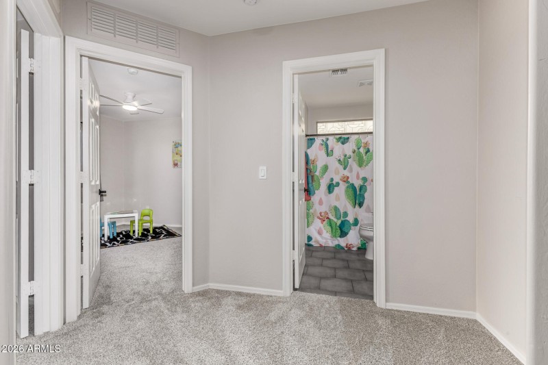 Hallway to guest bedrooms & bath