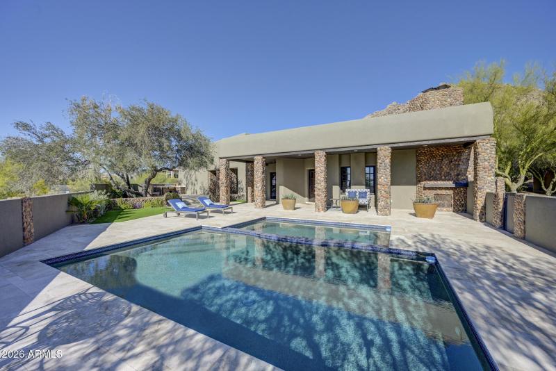 Pool and spa facing the home