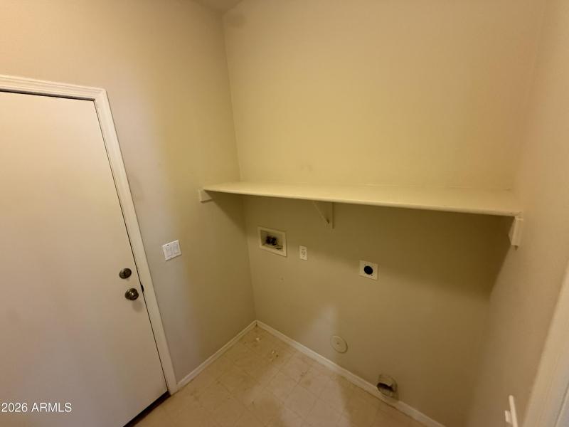 Laundry Room with Storage Shelf