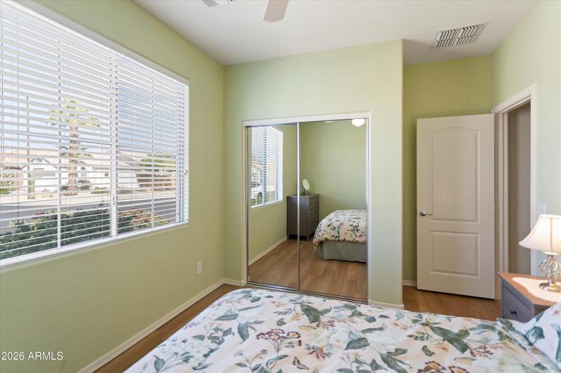 Guest Bedroom with Mirrored Wardrobe