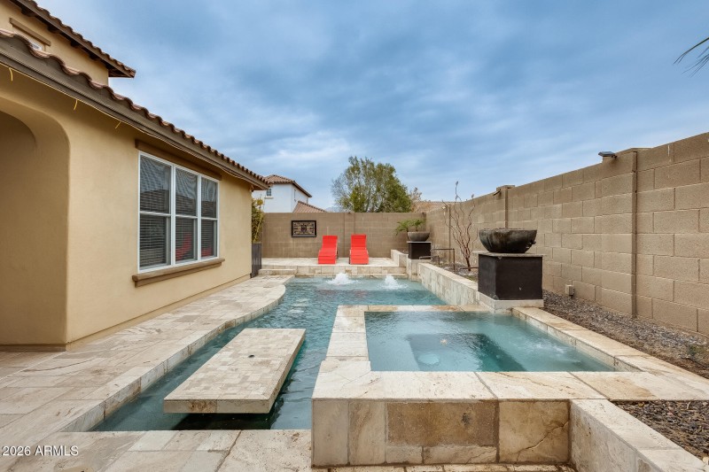 Sit in pool with 3 barstools