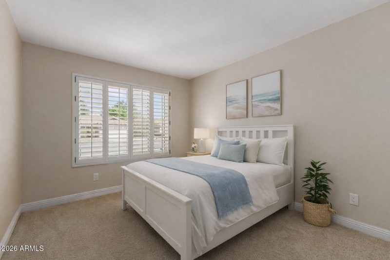 Serene guest bedroom with coastal touche