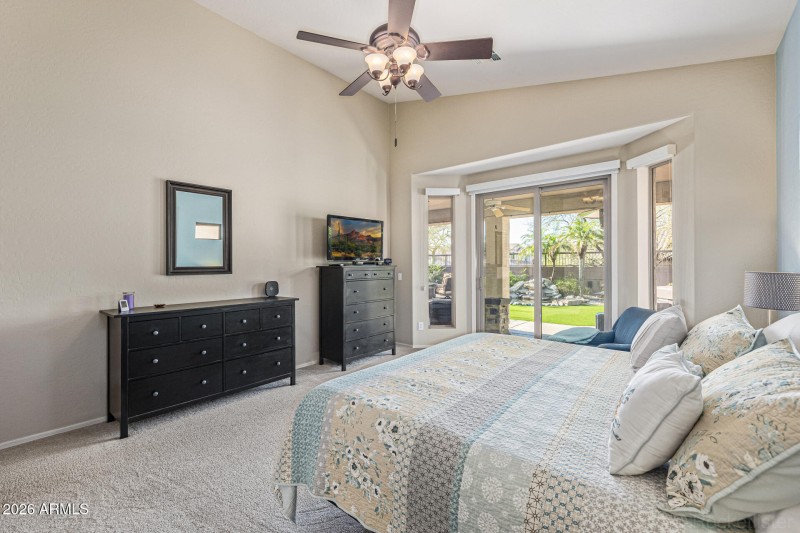 Primary Bedroom with Patio View