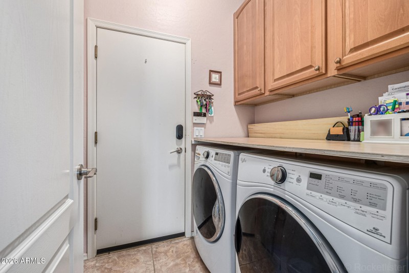 Laundry Room with Built-In Cabinets