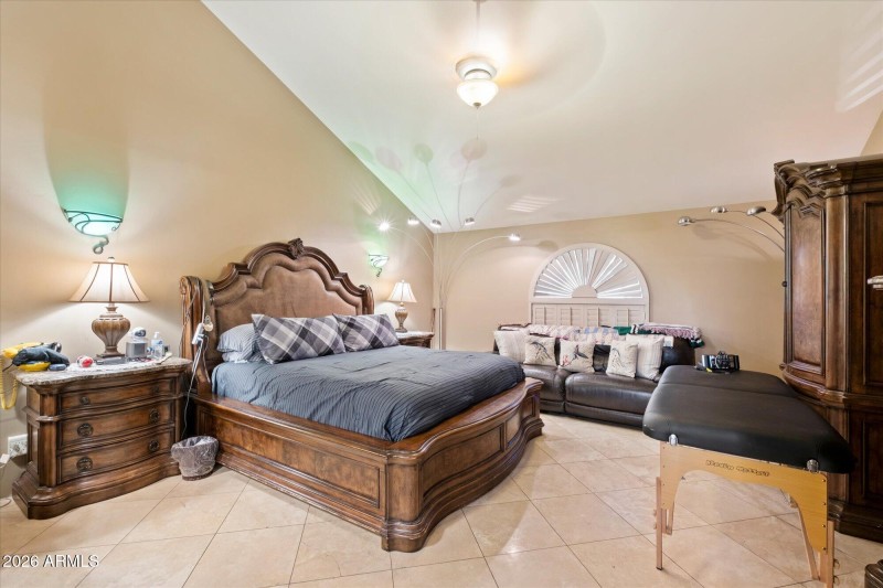 Primary w High Ceilings & Arched Window