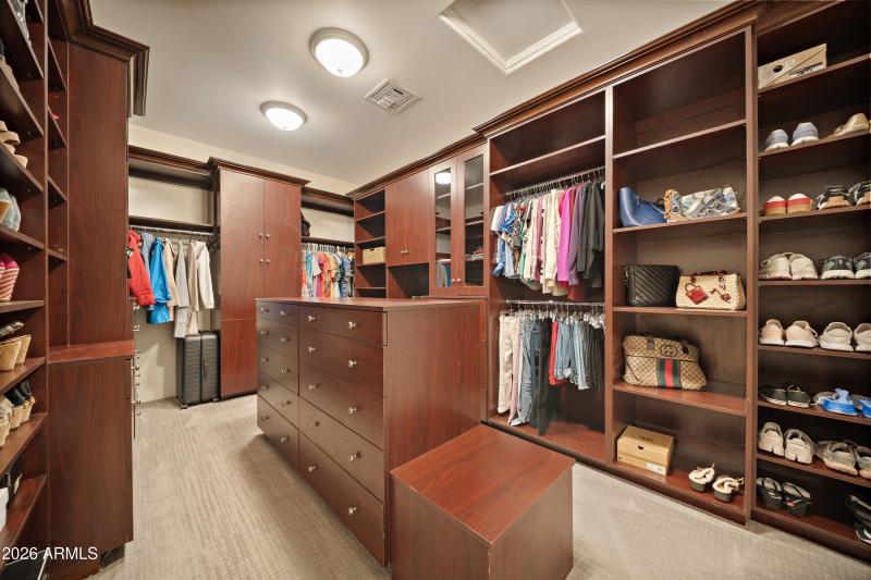 Two Large Custom Outfitted Closets