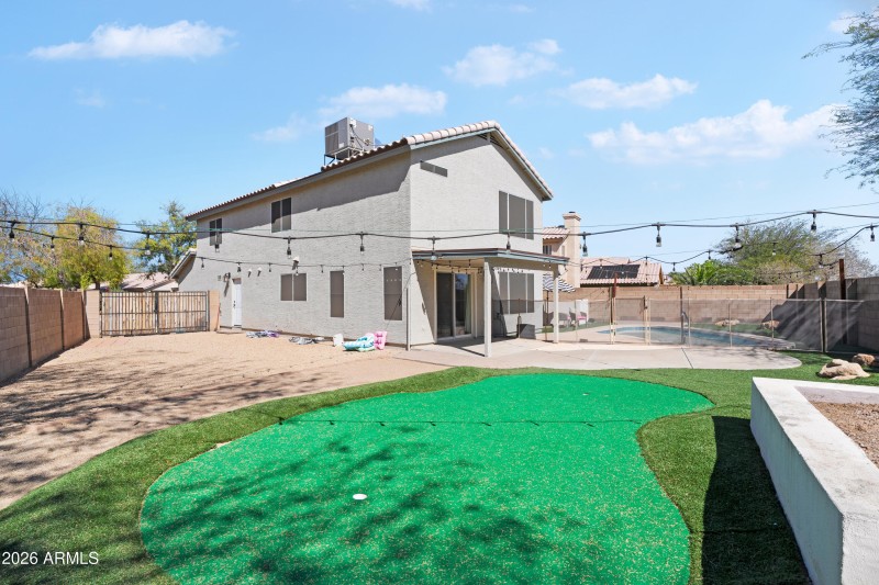 Large Side Yard with Mini Putt