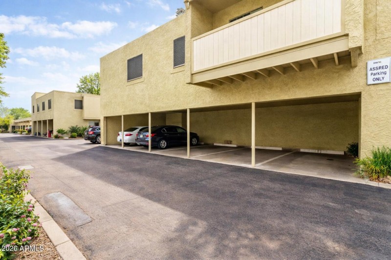 Residential carport parking on sunny day
