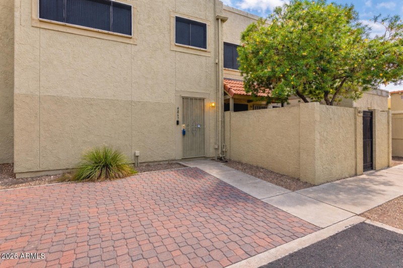 Inviting townhouse entrance and landscap