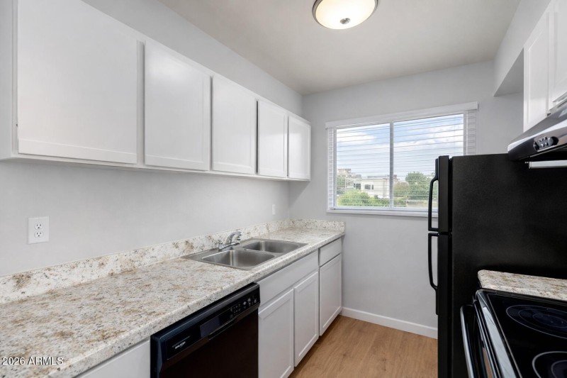 Modern galley kitchen with natural light