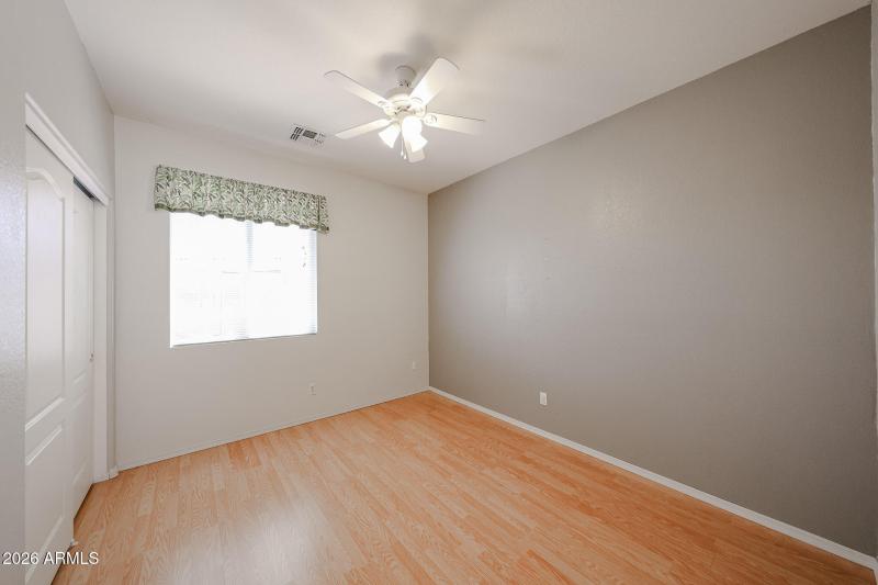 Bedroom 2 with laminate hardwood floors