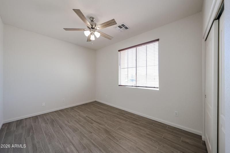 Bedroom 3 with wood looking tile