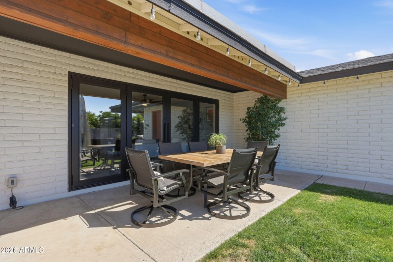 Covered back patio with glass doors