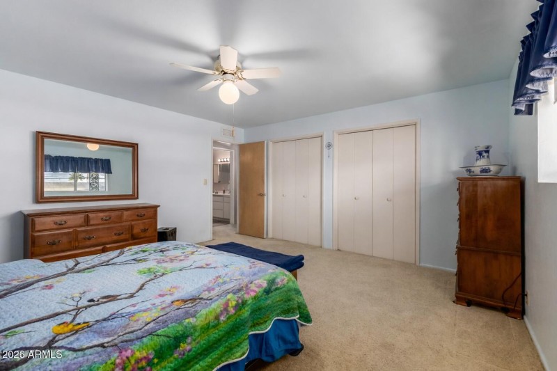 Serene bedroom with cherry blossom detai