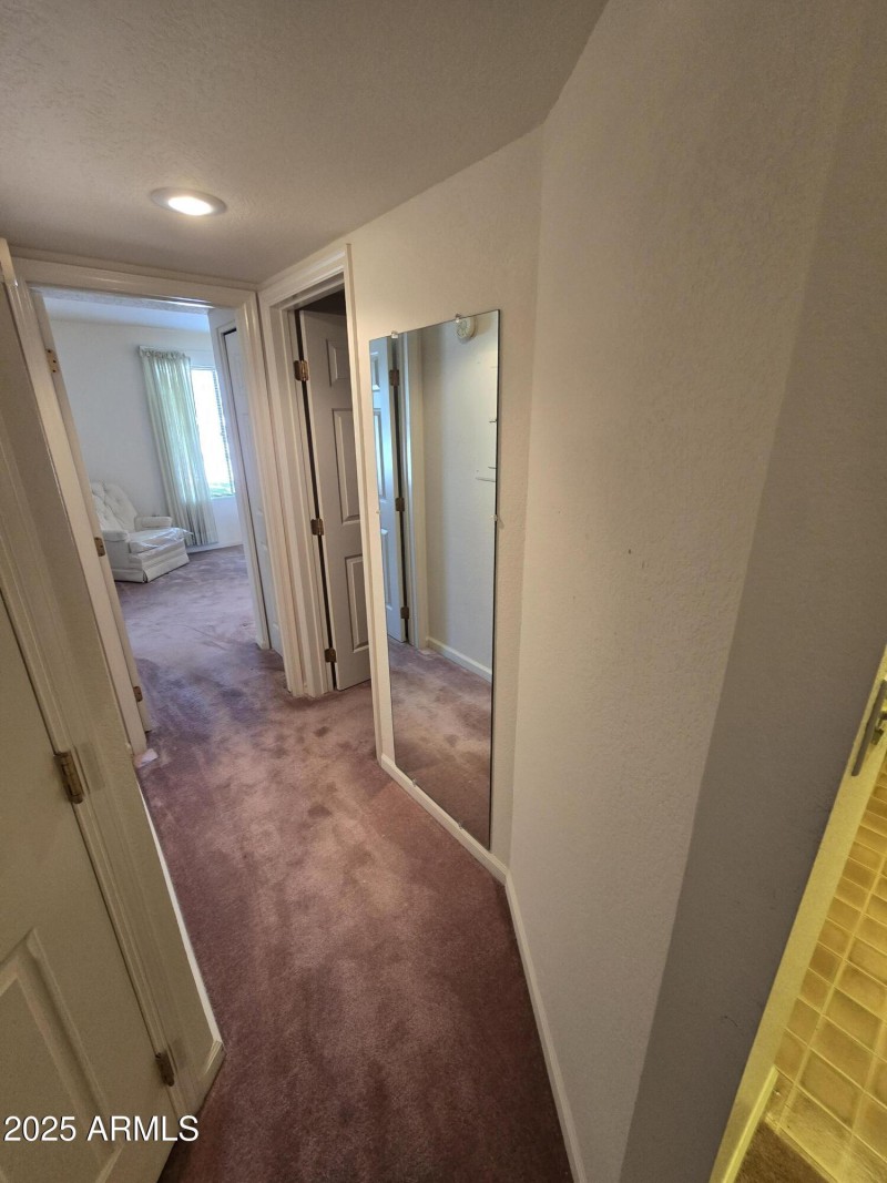 HALLWAY TO SECOND BEDROOM AND GUEST BATH