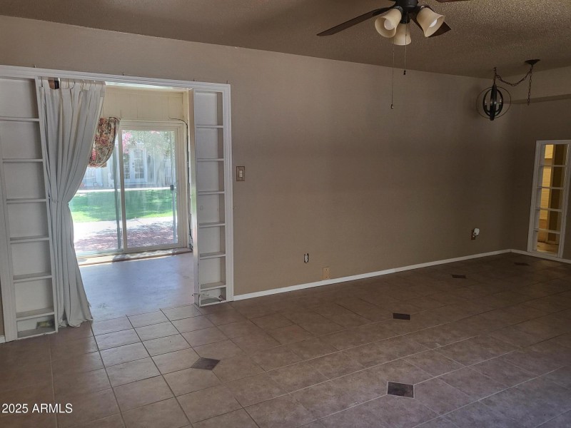 EXIT TO ENCLOSED PATIO