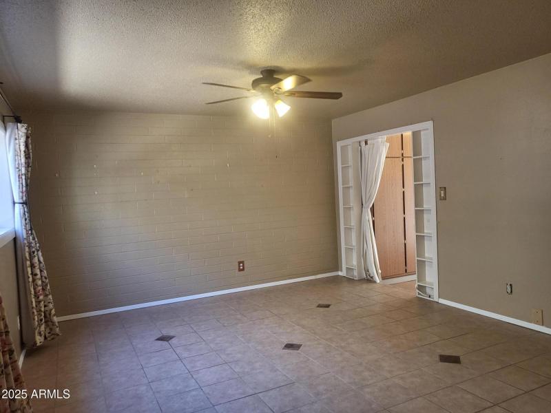 EXIT TO ENCLOSED PATIO