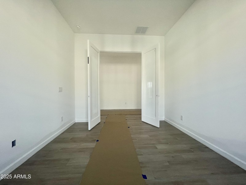 015 den with double doors