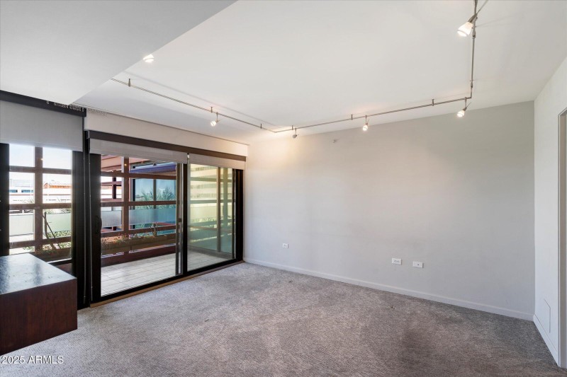 Primary Bedroom & Private Balcony