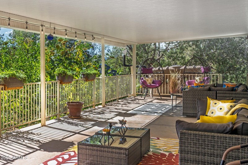 Covered Porch Faces Gardens