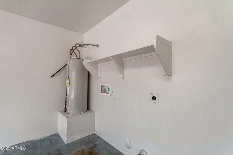 Laundry Area with Storage Shelf