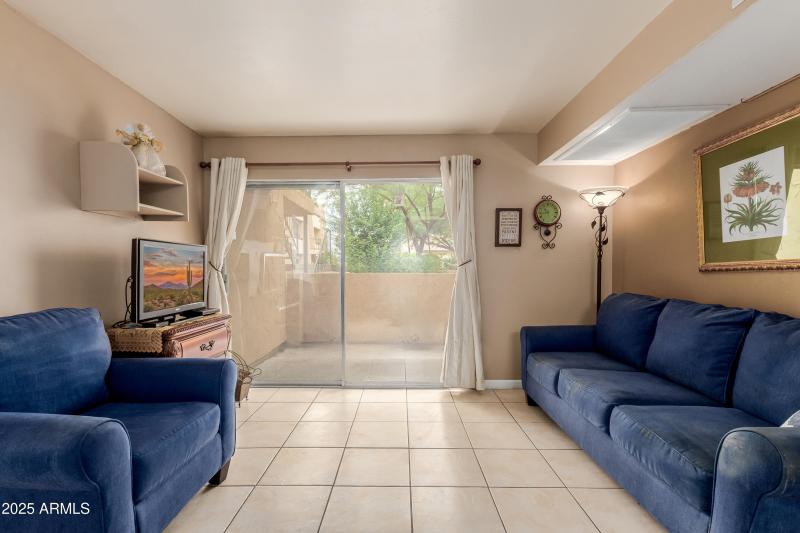 Living room facing oversized patio