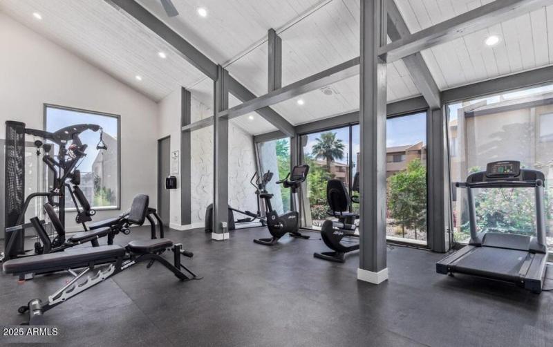 Gym is steps from this unit