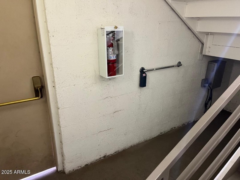 Lockbox on rail in left stairway door