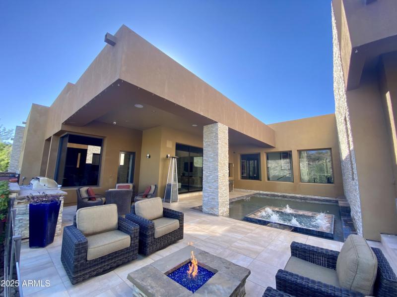 TELESCOPIC DOORS OPEN TO A PRIVATE OASIS