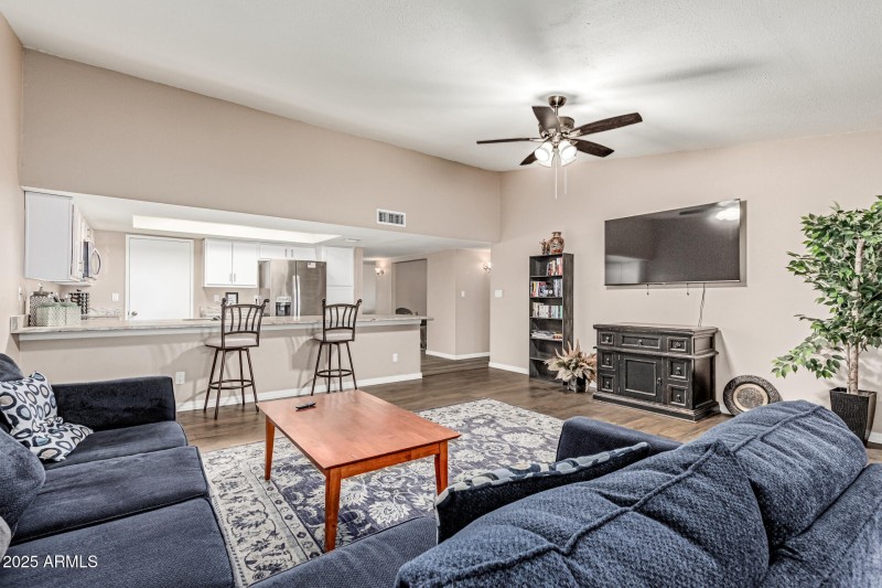 Livingspce opens to kitchen