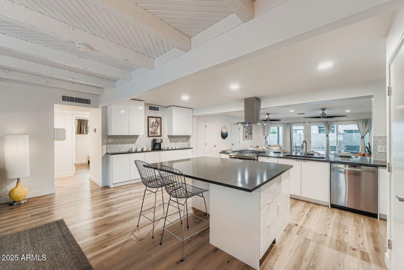 KITCHEN WITH ISLAND AND COFFEE BAR