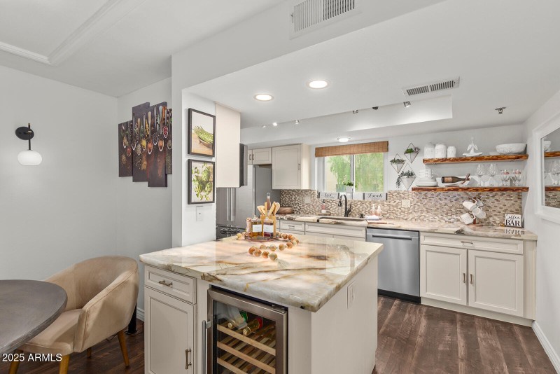 Island has built in wine fridge